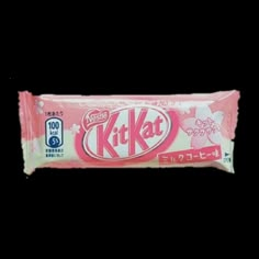 kitkat candy bar with pink flowers on the front and white writing on the back