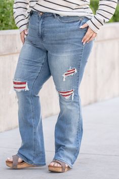 Judy Blue Elevate your fashion game with our Mid Rise Bootcut Jeans, showcasing a distinctive plaid patch detail that adds a touch of uniqueness to your look. Color: Medium Blue Cut: Boot Cut, 32.5" Inseam* Rise: Mid-Rise, 9.75" Front Rise* Material: 91% Cotton, 7% Polyester, 2% Spandex Stitching: Classic Fly: Zipper Style #: JB88696-PL | 88696-PL *Measured on the smallest size, measurements may vary by size. Contact us for any additional measurements or sizing. Judy Blue jeans run generous and Casual Patched Jeans For Fall, Casual Jeans With Patches For Fall, Casual Striped Jeans For Fall, The Boyfriends, Mid Rise Bootcut Jeans, Comfy Leggings, Stylish Skirts, Walk This Way, Judy Blue Jeans