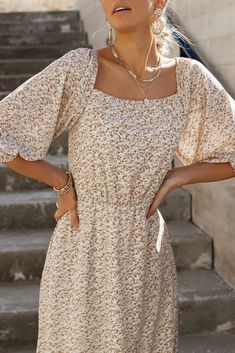 Model is wearing a floral midi dress with a square neckline, puff sleeves, and gold jewelry as accessories. Outfits Jean, White Floral Midi Dress, Tank Top Skirt, Blouse Sale, Wardrobe Edit, Flowy Maxi Dress, Sweater Sale, Smock Dress, Floral Midi Dress