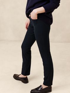 So soft, so stretchy, our customer-favorite Sloan pants return.  Tailored for a skinny fit, this innovative fabric has incredible stretch to deliver a smooth, supportive fit that won't stretch out.  Skinny Fit: Mid rise (9") with a skinny fit.  Ankle length.  Sustainability: Made with LENZING™ ECOVERO™, a breathable fiber derived from certified renewable wood sources, produced using methods that reduce water impact and emissions by up to 50% compared to traditional viscose.  Zip fly with hook-an The Gap, Welt Pockets, First Look, Ankle Length, Favorite Things List, Casual Pants, Banana Republic, Mid Rise, Work Wear