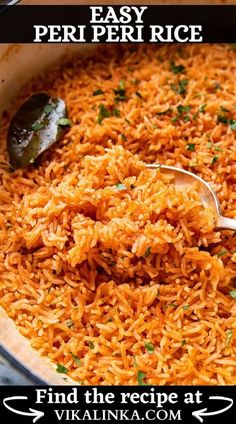 a close up of a bowl of rice with a spoon in it and the words, easy peri per rice