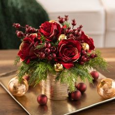 Overall Dimensions: 12" L x 12" W x 12" H Gold Pot Dimensions: 6" H x 6" W x 6" D Lifelike Floral & Botanical Indoor Use Designed, Handcrafted in Ohio Merry Christmas! Our Velvet Burgundy Rose, Mixed Cedar & Metallic Cherry Berry Christmas Floral Arrangement in Gold Textured Pot is the perfect statement piece for your kitchen, dining room, office, or any space that needs a little life! Darby Creek Arrangements also makes for an exquisite gift that can be enjoyed for years to come. At Darby Creek Modern Christmas Flower Arrangements, Christmas Banquet Centerpieces, Native Arrangements, Christmas Table Centerpieces Elegant, Christmas Floral Centerpieces, Christmas Sleigh Centerpiece, Christmas Lush, Christmas Floral Arrangements Diy, Christmas Arrangements Centerpieces