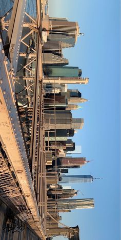 looking up at the top of a tall building in new york city, from below