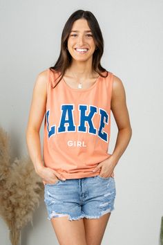 Lake girl comfort color tank top from Lush Fashion Lounge women's boutique in Oklahoma City. Lush Fashion Lounge is known for a large selection of trendy graphic t-shirts and cute graphic tank tops, especially lake tank tops and lake t-shirts! Model is 5'7 size 24 wearing small. Made locally. 100% cotton. Unisex fit. Lake Outfit, Lake Girl, Graphic Tank Tops, Tie Dye Tank Top, Women's Boutique, Comfort Color, Pink Tank Top, Oklahoma City, Terra Cotta