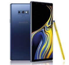 the new samsung note 9 is next to a yellow pen