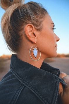 "Opalite is a purity stone that stimulates joy and positive vibrations. The powder blue white color feels angelic. These handmade, gold hammered hoops are unique and make you feel like you own every room you step into. ▲ Opalite gemstone arrowheads electroplated in 14k gold ▲ 2\" hammered gold plated hoops ▲ Drop length 2.5\" ▲ Weight: 1/4 oz ▲ Hypoallergenic ▲ Comes gift-ready in a beautiful white jewelry box ▲ Handmade just for you ✦ N A T U R A L - V A R I A T I O N ✦ Please note, these are r Positive Vibrations, Dangle Earrings Boho, Bride Earrings, Hammered Gold, Handmade Gold, Etsy Earrings Dangle, Gold Hoops, Blue Earrings, Polish Jewelry