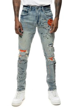 - SLIM TAPERED FIT- 98% COTTON, 2% ELASTANE- Placid Blue- Natural washing- Stretchy denim- Antique silver button with 'Smoke Rise' logo- Rip and Repair- Patchwork and embroidery Blue Casual Jeans With Graphic Print, Casual Blue Jeans With Graphic Print, Fall Blue Jeans With Graphic Print, Urban Blue Jeans For Spring, Blue Graphic Print Jeans For Fall, Fall Graphic Print Blue Jeans, Urban Fitted Blue Jeans, Blue Cotton Jeans With Graphic Print, Blue Graphic Print Jeans For Spring