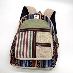 Introducing our handmade hemp backpack, a durable and eco-friendly option for carrying all your essentials. Crafted by skilled artisans, this backpack is made from high-quality hemp fiber and Heavy Duty Gheri Cotton fabric, known for its strength and durability. Not only is this backpack sturdy, but it also features a spacious interior with plenty of room for your laptop, books, and other daily necessities. The adjustable straps provide a comfortable fit, and the reinforced stitching ensures the Bohemian Backpack In Natural Color For Everyday Use, Bohemian Style Natural Color Backpack For Everyday Use, Casual Hemp Bags For Daily Use, Eco-friendly Brown Backpack For Everyday, Eco-friendly Brown Backpack For Travel, Eco-friendly Everyday Brown Backpack, Everyday Eco-friendly Brown Backpack, Eco-friendly Brown Everyday Backpack, Eco-friendly Brown Travel Backpack