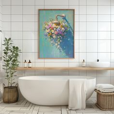 a bathroom with white tile and a painting on the wall above the bathtub that has flowers in it