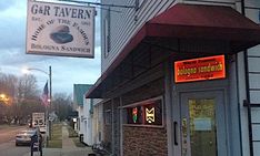 the entrance to gar tavern, which has been closed for business