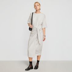 The classic t-shirt dress gets a fashion-forward update with this organic cotton, wrap-waist midi. Noa is perfect for throwing on with sneakers for an afternoon out or pairing with heeled sandals for dinner. See below for our general Size Guide and available measurements Made of 95% organic cotton and 5% spandex Machine wash cold and lay flat to dry Heeled Sandals, T Shirt Dress, Lay Flat, Cotton T Shirt, Size Guide, Cotton Tshirt, Fashion Forward, Wrap Dress, Sandals Heels