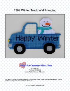 a blue truck with a snowman in the back and happy winter written on it