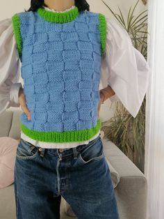 Handmade wool vest. Blue and neon green sweater vest crew neck . The trims of the sweater vest are in red. Hand knitted sleeveless jumper. Fits like a S. Measurements lying flat: Bust: 43 cm Length: 47 cm Neon Green Sweater, Jumper Fits, Green Sweater Vest, Sleeveless Jumper, Wool Vest, Vest Outfits, Green Sweater, Neon Green, Sweater Vest