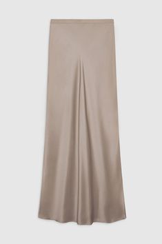 Designed by Anine Bing. The best-selling Bar Silk Maxi Skirt in taupe is made from 25 mm double-faced silk charmeuse cut on the bias for a smooth silhouette that sits high at the waist and hugs the body through the hips. This style features an elasticated waistband for a comfortable, pull-on construction. Fit: The high-waisted, maxi-length Bar Silk Skirt is cut for a close, streamlined fit. Take your true size. Model is wearing a size S. Model Measurements: Height: 5'9", Bust: 30", Waist: 23", H Silk Maxi Skirt, Silk Maxi, Anine Bing, Silk Charmeuse, Wardrobe Basics, Silk Skirt, Clothing Labels, Skirt Design, Skirts For Sale