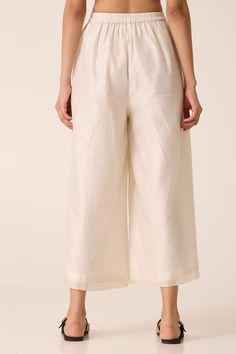 Wide-leg pants with a gentle flare. Slightly elasticated back. In-seam pockets. Fully lined. Ready Garment Measurements in Inches : XS S M L XL Waist 25 27 29 31 33 Hip 40 42 44 46 48 Length 35 35.25 35.5 35.75 36 Signature Print, Denim Outfit, Jacket Tops, Leg Pants, Wide Leg Pants, Best Sellers, Pants Set, New Dress, Wide Leg