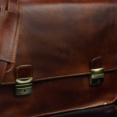 The No. 2 briefcase fits in wherever you do business. The impressive premium leather messenger briefcase combines a timeless design with modern functionality. Handcrafted in Florence, Italy from the finest premium Italian leather—full-grain vegetable-tanned cow leather — and available in several classic colors. The inside of the No. 2 has been lined with hard-wearing cotton canvas and convenient compartments make it easy to carry your everyday and business essentials fully organized. Comfortably Luxury Cognac Briefcase For Business, Timeless Cognac Briefcase For Everyday Use, Leather Briefcase With Luggage Sleeve In Cognac, Cognac Leather Briefcase With Luggage Sleeve, Classic Cognac Laptop Bag For Business Trips, Luxury Vegetable Tanned Leather Satchel For Business, Cognac Soft Leather Satchel For Business, Business Briefcase With Leather Lining In Cognac, Business Briefcase In Cognac With Smooth Grain