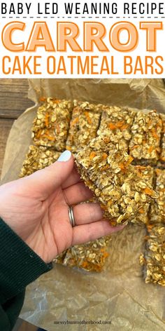 woman's hand holding carrot cake oatmeal bars Carrot Breakfast, Carrot Bars, Carrot Oatmeal, Clean Dinner Recipes, Carrot Cake Bars, Oatmeal Breakfast Bars, Carrot Cake Oatmeal, Homemade Snickers