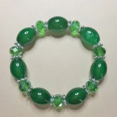 Green Agate & Crystals Bracelet Material Content: Agate, Crystals, Nickel Free, Lead Free Casual Green Agate Bracelets, Casual Green Agate Bracelet, Elegant Green Agate Crystal Bracelet, Casual Green Stretch Bracelet With Natural Stones, Green Agate, Agate Crystal, Crystal Bracelets, Womens Jewelry Bracelets, Agate