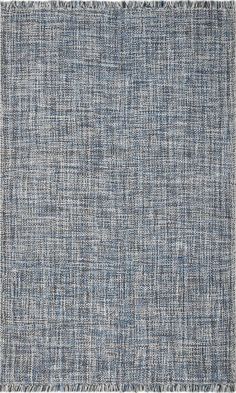 a blue rug with fringes on it