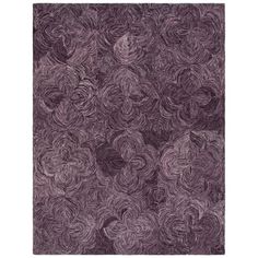 a purple rug with swirls on it