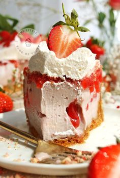 a piece of cake with strawberries on top