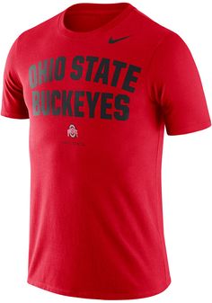 Show off your team pride in this Ohio State Buckeyes Red Phrase Short Sleeve T Shirt! This The Ohio State University Short Sleeve Tee features a screen print of 'The Ohio State' on center chest. Make sure everyone knows you root for the Buckeyes with this Red The Ohio State University T Shirt. Go Buckeyes! Dri-Fit Cotton, Screen printed team specific local verbiage in generic team font, Team logo/name lockup printed below, Swoosh design trademark on left shoulder, Fit: True to Size, 57% COTTON/ Dri-fit T-shirt For Sports Events, Nike Sports T-shirt With Team Logo, Nike Moisture-wicking T-shirt For Fans, Nike Moisture-wicking Fan Apparel T-shirt, Nike Collegiate T-shirt For Sports Events, Dri-fit Tops For Sports Events And Season, Nike Collegiate Red Tops, Nike Red Collegiate Top, Nike Collegiate Moisture-wicking T-shirt