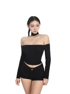 Capture the essence of cool confidence with this Off-Shoulder Long Sleeve Crop Top with Choker. Made for statement-making style, this top boasts a solid color design and is crafted with a comfortable yet durable material composition. The off-shoulder silhouette paired with long sleeves and a chic choker creates a look that is both edgy and sophisticated. Its slim-type fit accentuates the body's form, ideal for a variety of body shapes. Perfectly suited for a range of occasions, pair this crop top with high-waisted pants for an effortlessly cool vibe or a flirty skirt for a night out. Its versatility makes it a staple for any fashion-forward wardrobe, striking the right balance between moodiness and professionalism. Product specifications: Material: 100% Polyester Collar: Off-shoulder with Off Shoulder Crop Top, Black Choker, Shoulder Crop Top, Long Sleeve Crop, Long Sleeve Crop Top, High Waisted Pants, Body Shapes, Fashion Forward, Top Styles