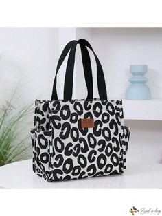 Bird in Bag - Chic and Multi-Functional Handbag Lunch Tote, Ideal for Professionals and Busy Mothers Functional Black Diaper Bag With Large Capacity, Casual Black Lunch Bag For Travel, Black Large Capacity Rectangular Diaper Bag, Black Large Capacity Lunch Bag For Everyday Use, Large Capacity Black Diaper Bag For Daily Use, Black Rectangular Lunch Bag With Large Capacity, Black Tote Lunch Bag For Everyday, Black Diaper Bag With Large Capacity For Daily Use, Trendy Black Lunch Bag For Travel