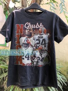 Vintage 90s Graphic Style Nick Chubb T-Shirt, Nick Chubb shirt, Vintage Oversized Sport Tee, Retro American Football Bootleg Gift shirt for men women, fan tees, vintage shirts, retro tees, 90s graphic tee, sports tee, bootleg, tshirt, y2k shirt, Nick Chubb tee, Nick Chubb shirt, Football tee, Football shirt -----𝐇𝐎𝐖 𝐓𝐎 𝐎𝐑𝐃𝐄𝐑----- 1-) Please, check and review all photos 2-) Choose your t-shirt size and color 3-) Click add to cart. You can go back to add more product 4-)Click "Proceed to Nick Chubb, Graphic Style, Retro Tee, Football Tees, Sport T-shirts, Sports Tees, American Football, Football Shirts, Vintage Shirts