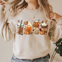 "Fall Coffee Sweatshirt, Pumpkin Spice Shirt, Fall Sweater, Fall Sweaters for Women, Hello Pumpkin, Pumpkin Sweatshirt, Pumpkin Sweater, Its Fall Yall, Happy Fall Yall, Happy Fall, Fall Vibes These sweatshirts are so soft and comfortable! They are perfect to wear on a cool Fall day while you enjoy a pumpkin spice latte, go to the pumpkin patch, or celebrate Thanksgiving!  For an oversized look, order a size or two up from your normal size. Materials: 50% cotton, 50% polyester Medium-heavy fabric (8.0 oz/yd² (271.25 g/m Loose fit Sewn-in label Runs true to size Sizing: These are unisex sweatshirts so they fit a bit looser than women's sweatshirts. Please refer to the size chart image in the listing. I recommend taking one of your favorite sweatshirts and measuring it while it's laying flat. Pumpkin Sweater, Cute Sweaters For Fall, Fall Sweaters For Women, Pumpkin Spice Shirt, Pumpkin Pumpkin, Pumpkin Sweatshirts, Coffee Sweatshirt, Hello Pumpkin, Gildan Sweatshirt