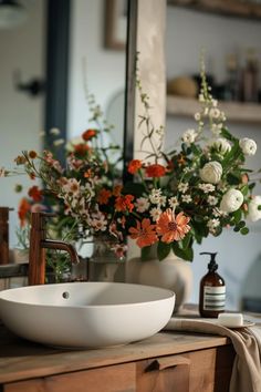 A delightful farmhouse powder room showcasing rustic designs and chic decor. Perfect for inspiration on transforming your small bathroom with a charming flair.