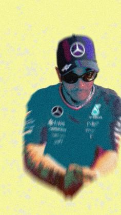 a blurry photo of a man wearing sunglasses and a hat with the mercedes logo on it