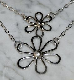 Delightful Daisy necklace by Bybella on Etsy, $72.00 Silver Hypoallergenic Flower Necklace, Silver Hypoallergenic Flower Pendant Necklace, Hypoallergenic Silver Necklace With Flower Pendant, Hypoallergenic Silver Flower Pendant Necklace, Silver Flower Pendant Necklace With Soldered Detail, Hand Forged Silver Dainty Necklace, Large Daisy, Layered Chain, Daisy Necklace