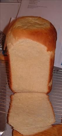 a loaf of bread sitting on top of a cooling rack