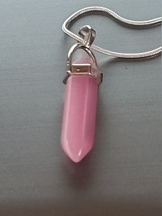 "Pretty rose quartz stone set in a silvertone setting on an 18\" snake chain with lobster claw clasp." Pink Snake Chain Jewelry Gift, Pink Sterling Silver Pendant Crystal Necklace, Pink Sterling Silver Snake Chain Jewelry, Pretty Rose, Chakra Pendant, Pretty Roses, Rose Quartz Stone, Quartz Stone, Snake Chain