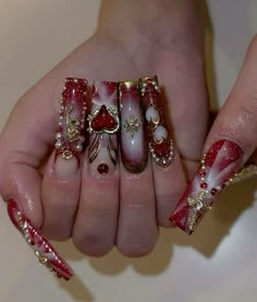 Betty Boop Inspired Nails, Nails With Hanging Charms, 2006 Nails, Low Rider Nails, Y2k Long Nails, Chicano Nails Designs, Y2k Red Nails, Red Junk Nails, Long Y2k Nails