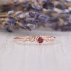 Small & dainty 14k rose gold antique victorian pink ruby engagement ring, Delicate minimalist art deco style ruby promise ring for her WE OFFER UNLIMITED PERIOD INSTALLMENTS PLAN This is a beautiful, stunning, feminine ring that works well for all occasions, styles, and ages. You will love it! Ring information: Main stone: Ruby Approximate size: 2.5mm Accent stones: Cubic zirconia Approximate size: 1.25mm (4 stones) Metal type: Gold Metal stamp: 14k Gold Installment Payments We offer install Elegant Lab-created Ruby Jewelry For Promise, Elegant Jewelry With Lab-created Ruby For Promise, Elegant Ruby Ring With Rose Cut Diamonds For Wedding, Dainty 14k Rose Gold Solitaire Jewelry, Elegant Promise Ruby Ring With Round Band, Elegant Lab-created Ruby Promise Ring Jewelry, Elegant Promise Ruby Ring, Elegant Lab-created Ruby Jewelry For Promise Ring, Elegant Promise Ruby Ring With Bezel Setting