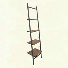 a tall wooden shelf with three shelves on each side and two ladders at the top