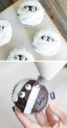 the cupcakes are decorated with white frosting and eyes