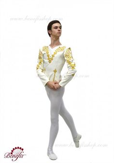 a man in white and gold is standing with his hands on his hips while wearing a long sleeved leotard