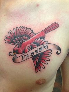 a man with a tattoo on his chest has a bird holding a banner in it