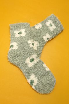 These soft fluffy socks are designed to provide maximum comfort, with a soft and fluffy material that feels gentle against your skin. Made from soft coral fleece material, these socks offer luxurious comfort with a playful twist. Adorned with charming fruit and flower designs. The socks are also designed to be lightweight and flexible, which allows you to move your feet freely without feeling constrained. You can wear with PJ or lounge wear. One Size Fits Allyarn: coral fleecematerial: polyester Brrr Basket, Trendy Socks, Fluffy Socks, Soft Coral, Comfy Socks, Daisy Design