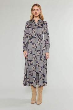 A floral-infused checker motif adds to the charm of this shirt dress. Wear it buttoned all the way up for a polished look, or leave it undone to convey a casual vibe. The tie belt is optional, so you can draw in the waist or let it flow. Finally, the ultra-plush and silky feel of the fabric provides true comfort and everyday luxury. •Ultra soft •Pointed collar •Slim fit •Button placket •Three quarter sleeves •Button cuffs •Optional tie belt •Mid-length hem Item number 2390125-1 Gentle cycle cold Button-up Floral Print Dress For Daywear, Elegant Viscose Button-up Shirt Dress, Long-sleeved Belted Midi Dress In Viscose, Floral Print Cotton Button-up Shirt Dress, Multicolor Floral Print Button-up Shirt Dress, Vacation Dresses, Print Trends, Outerwear Coats, Sweater Sale