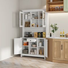 an open cabinet in the corner of a kitchen with lots of cupboards and shelves