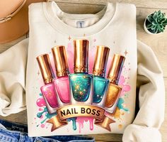 a t - shirt with nail polish bottles on it