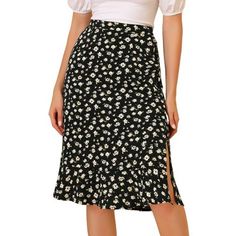 Through the summer seasons in this effortlessly chic flowy skirt. In a midi silhouette that wraps around, this skirt exudes the spring-summer feel we can't wait for. Sitting high on the waist, the light and breezy fabric trimmed with ruffles fall to a split skirt for impact and movement as you walk. Cut in a relaxed, flared shape, this skirt is designed with button closure at side flattering for showing your looming legs. Adding a beautiful floral flourish for feminine appeal, this style is a fu Short Floral Skirt, Floral Skirt Outfits, Split Midi Skirt, Midi Skirt Black, Flower Skirt, Split Skirt, Floral Midi Skirt, Floral Print Skirt, Black Midi Skirt