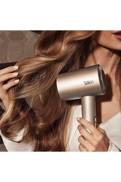 Get ultra-fast results with the powerful brushless motor reaching up to 110,000 rpm. Dry and style your hair in an instant with low temperatures and experience the multiple benefits of our Premium Water Ion technology that ensures less frizz and smoother hair. With its dynamic high-end LED display you can easily choose the setting you prefer.
- Concentrated air flow for ultra-fast drying and Premium Water Ion technology for less frizz
- Brushless motor reaches up to 110,000 rpm
- 6 temperatures, 1 cool shot function and 3 speed levels
- 3 meter long cable for more freedom of movement
- Includes 3 magnetic attachments, heat resistant mat and travel pouch
Powerful concentrated air flow With SilkyAir Pro's brushless motor with 110,000 rpm it is able to generate a powerful concentrated air flo Hair Appliances, Heat Damage, Fun Shots, Good Hair Day, Hair Quality, Split Ends, Strong Hair, Shiny Hair, Smooth Hair