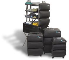 several pieces of luggage stacked on top of each other in front of a white background