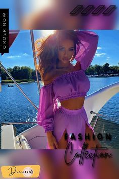 a woman in a purple dress standing on a boat with the caption fashion collection