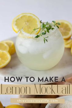 lemon mocko cocktail on a marble platter with sliced lemons in the background